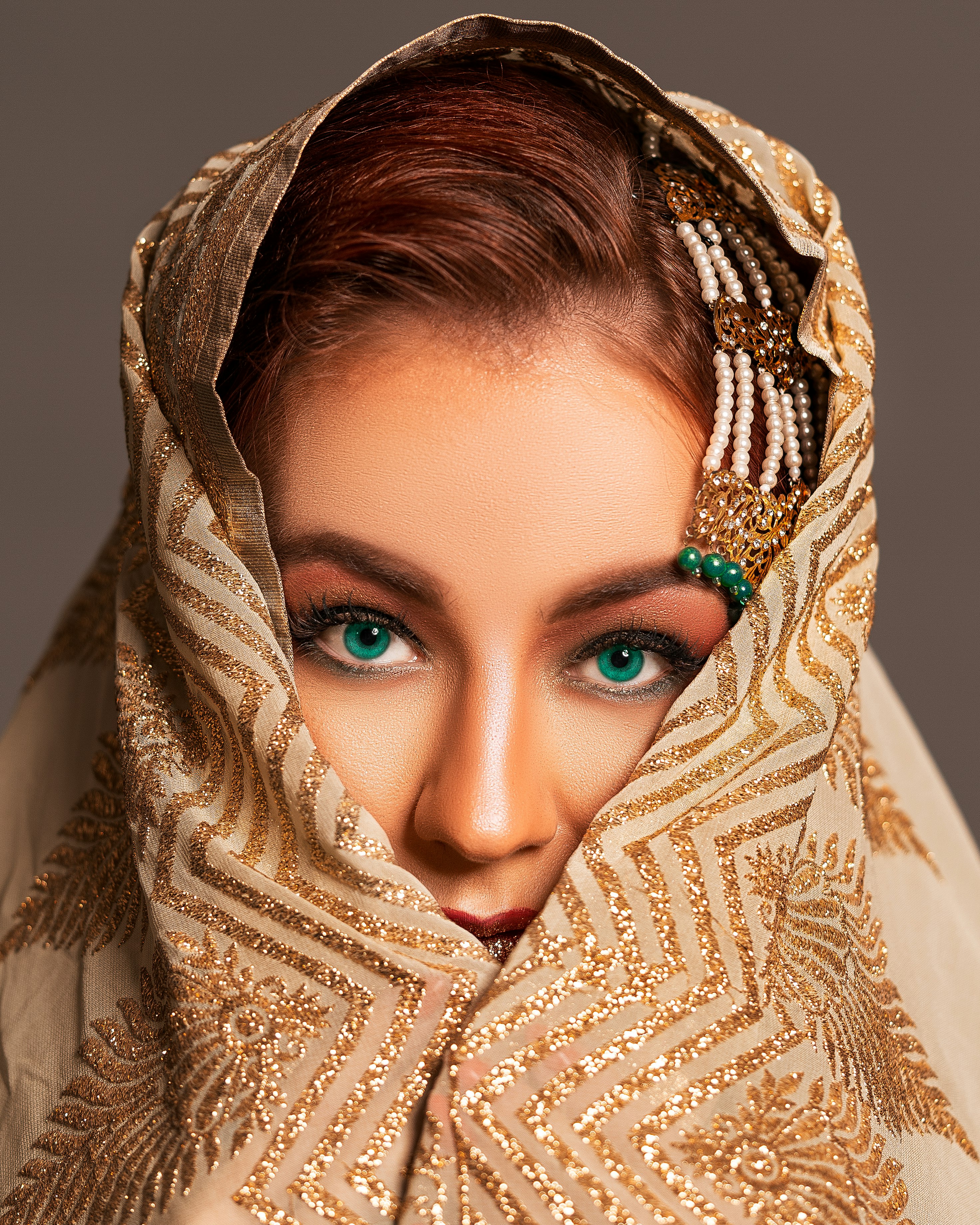 woman in brown and white hijab